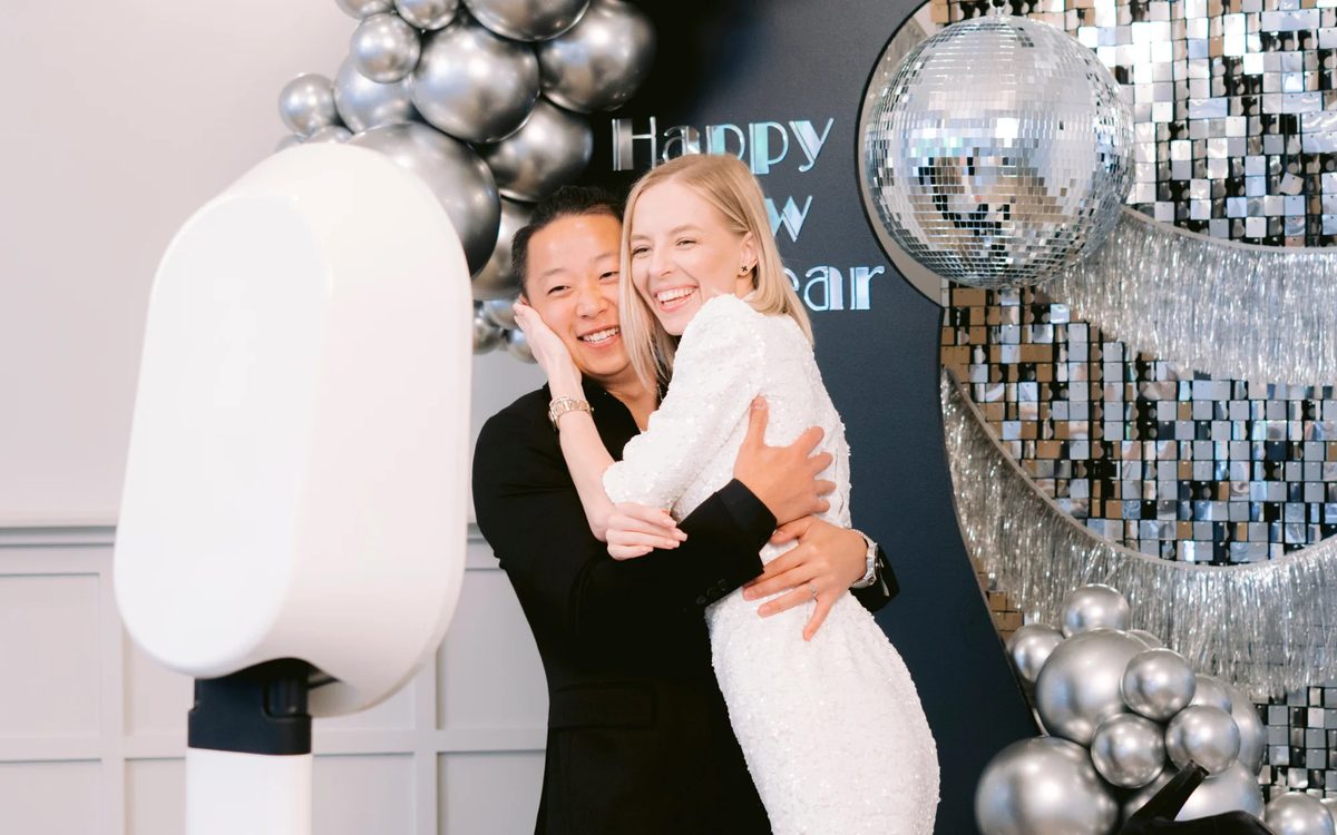 Couple posing with the Captivent photobooth